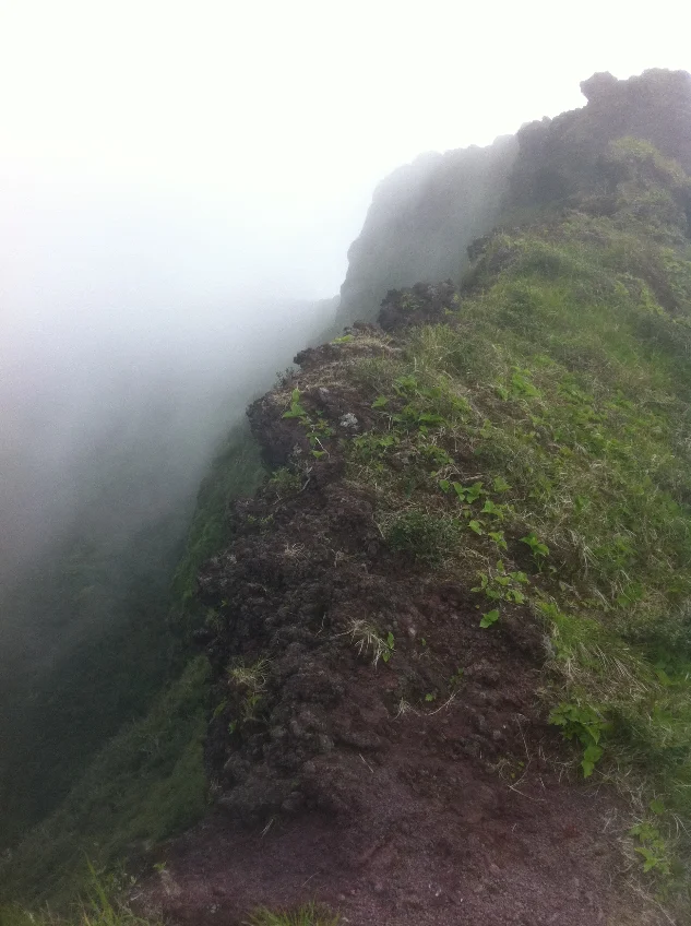 Cloud spilling over the crater rim on Hachijō-jima